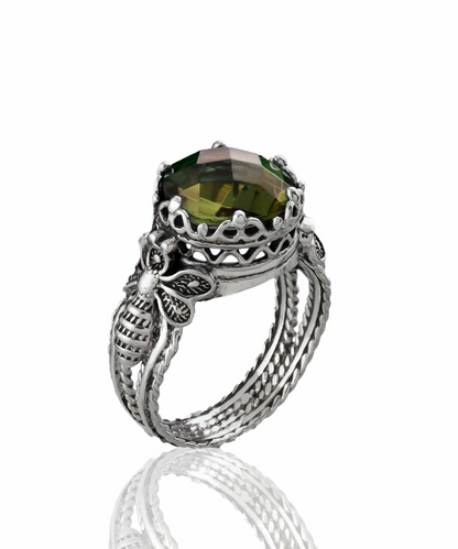 Silver cocktail ring featuring a detailed Alexandrite gemstone with filigree art design for women.