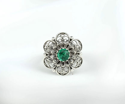 Silver statement ring with intricate filigree design and emerald gemstone for women, crafted by Start2Finish.
