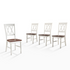Set of four Shelby dining chairs by Start2Finish, showcasing wooden legs and upholstered seats in a modern dining room setting.