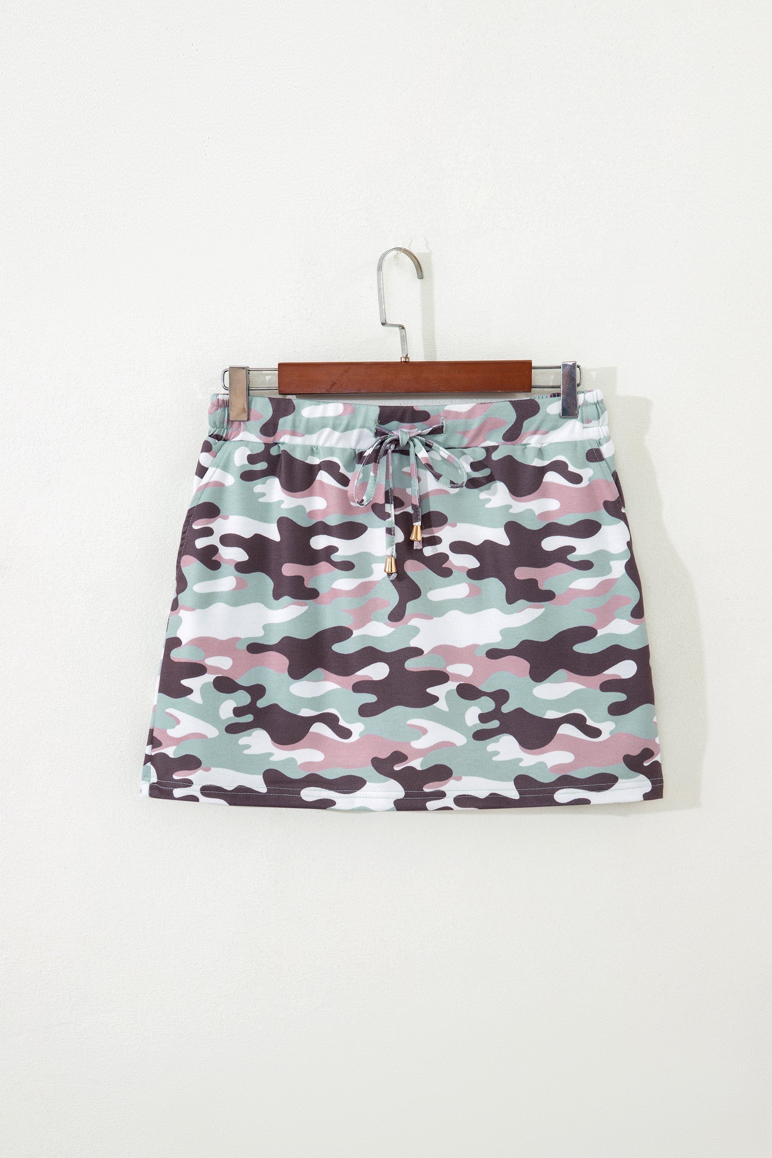 Women’s camo drawstring high waist mini skort by Byzantium Bay, featuring a stylish camouflage pattern and comfortable fit.