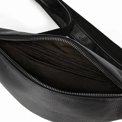 Black leather waist bag from Start2Finish, The Walcott Leather Fanny Pack with adjustable strap and compact accessory design.