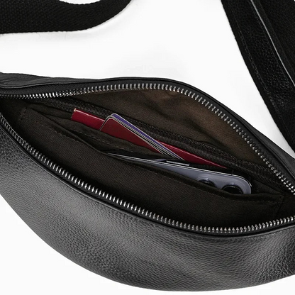 Black leather waist bag from Start2Finish, The Walcott Leather Fanny Pack, featuring a compact design and adjustable strap.