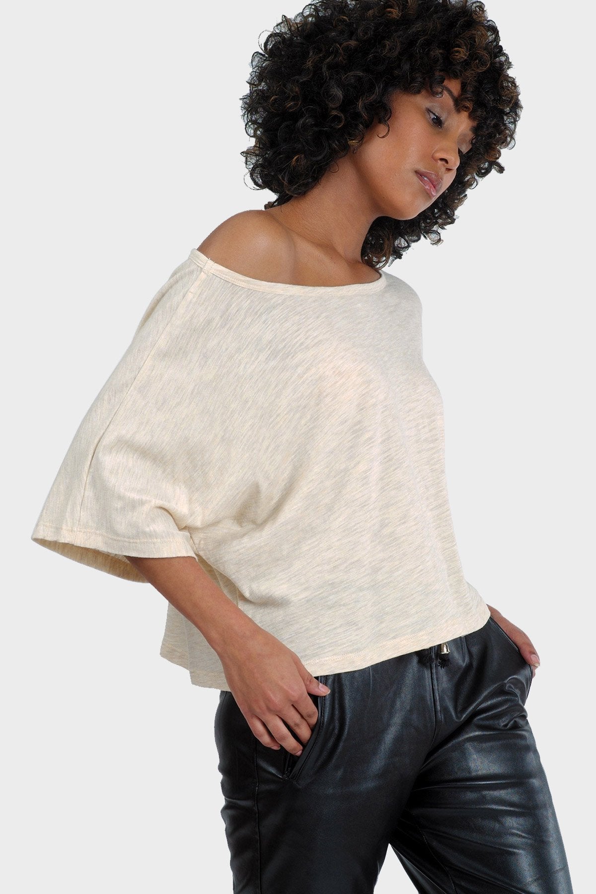 Gold Felix Lumi Organic Crop Top, stylish tops and blouses in soft fabric, shown on a model.