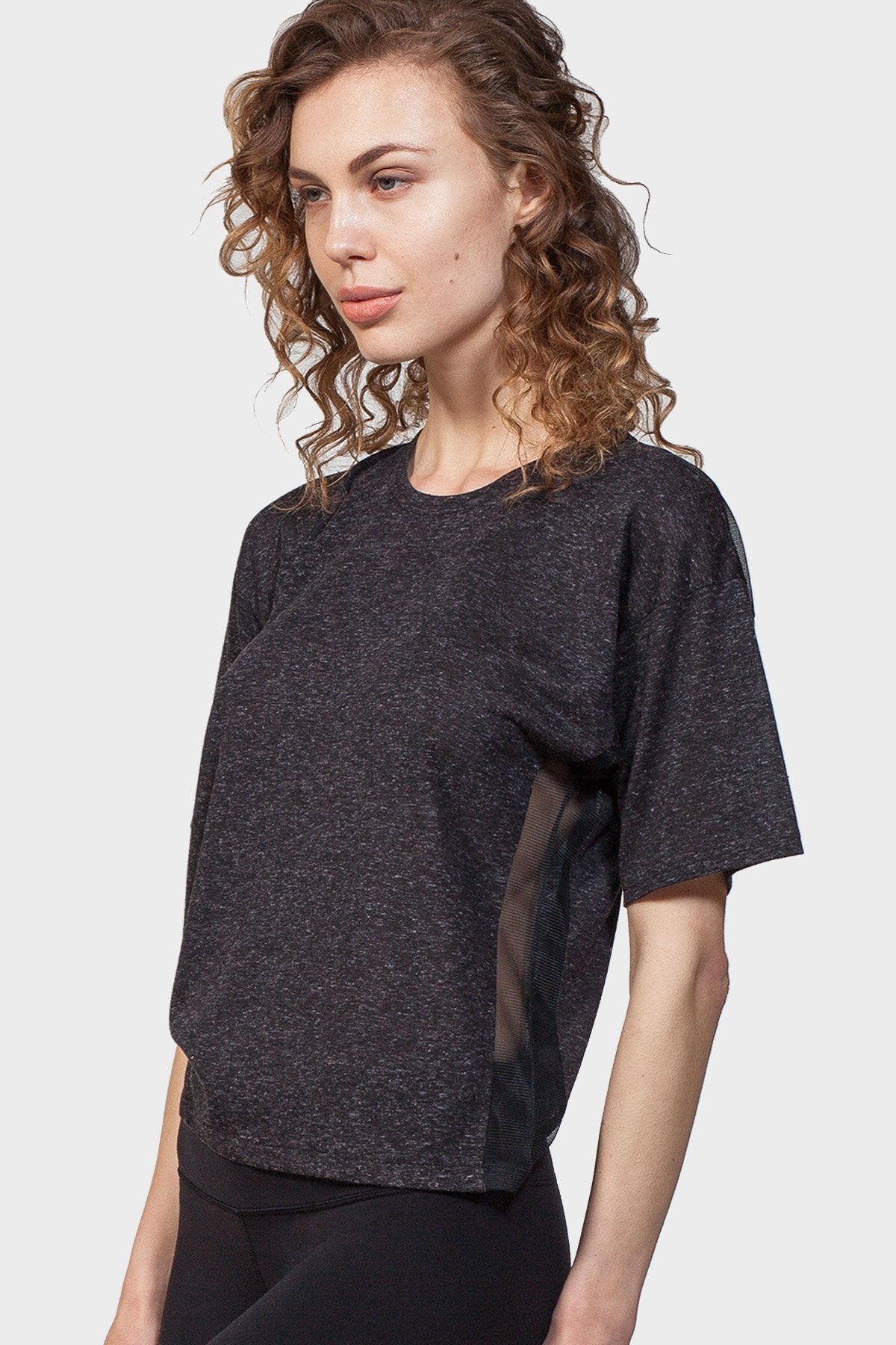 Gold Felix back mesh yoke top, stylish blouse with mesh yoke detail, short sleeves, and a fitted silhouette.