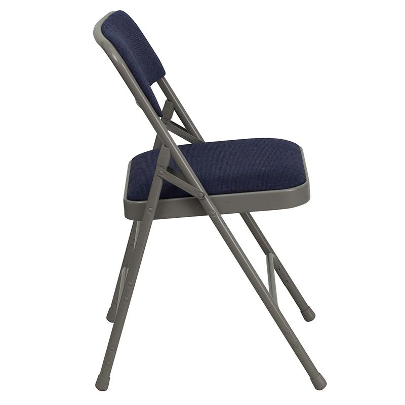 Two navy fabric folding chairs from Start2Finish Hercules Series with curved triple braced frames and double hinges, metal construction.