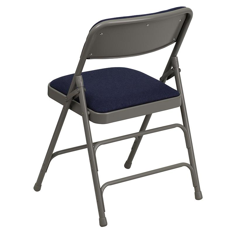 Two navy fabric HERCULES Series folding chairs with curved triple braces and double hinges, metal frames, and sturdy design.