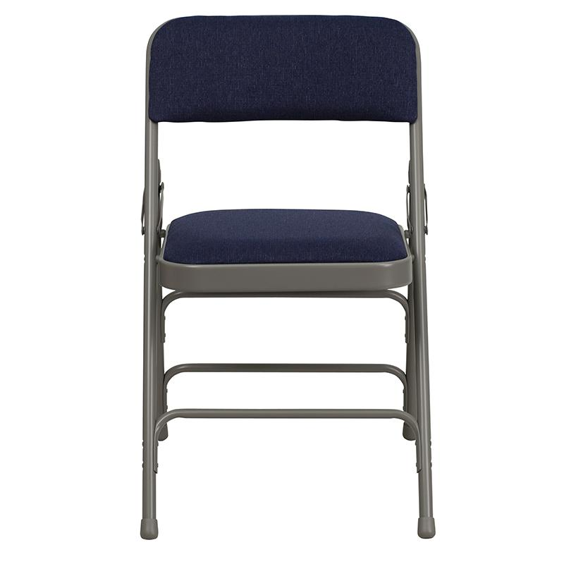 Two navy fabric HERCULES Series folding chairs with curved triple braced metal frames and double hinges, designed for durable furniture use.