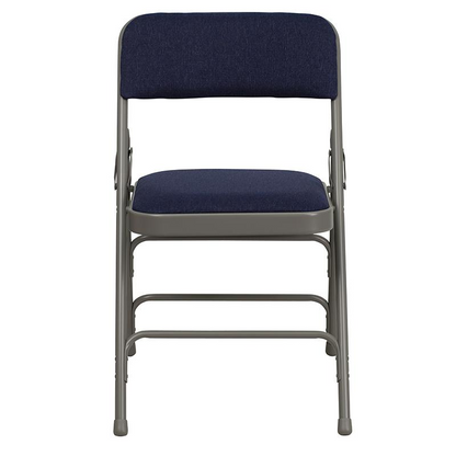 Two navy fabric HERCULES Series folding chairs with curved triple braced metal frames and double hinges, designed for durable furniture use.