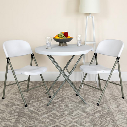 Set of 2 HERCULES Series white plastic folding chairs by Start2Finish with gray metal frames, lightweight and easy to fold.