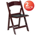 Two red mahogany resin folding chairs with black padded vinyl seats, sturdy furniture from Hercules Series by Start2Finish.