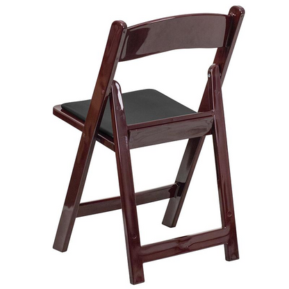 Two red mahogany resin folding chairs with black padded vinyl seats from Hercules Series, 1000 lb. capacity, by Start2Finish.