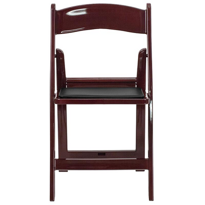 Two red mahogany resin folding chairs with black vinyl padded seats, 1000 lb. capacity, from HERCULES Series by Start2Finish.