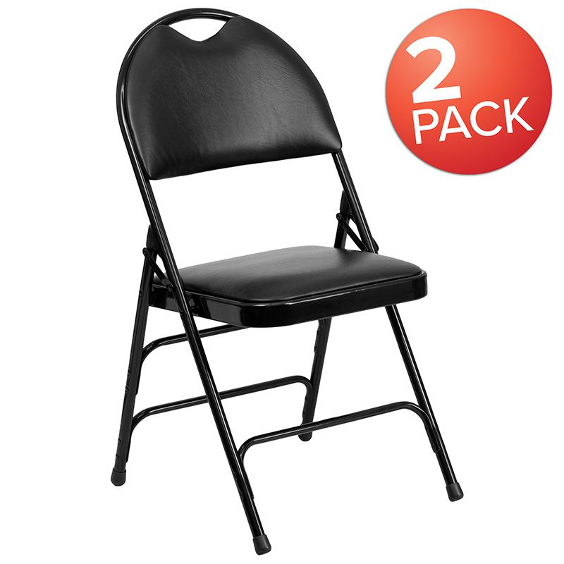 Two black HERCULES Series vinyl metal folding chairs with triple-braced frames and easy-carry handles, ideal for versatile furniture use.