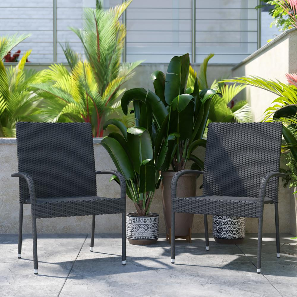 Set of 2 gray wicker dining chairs with arms, weather-resistant steel frames, designed for indoor and outdoor use.