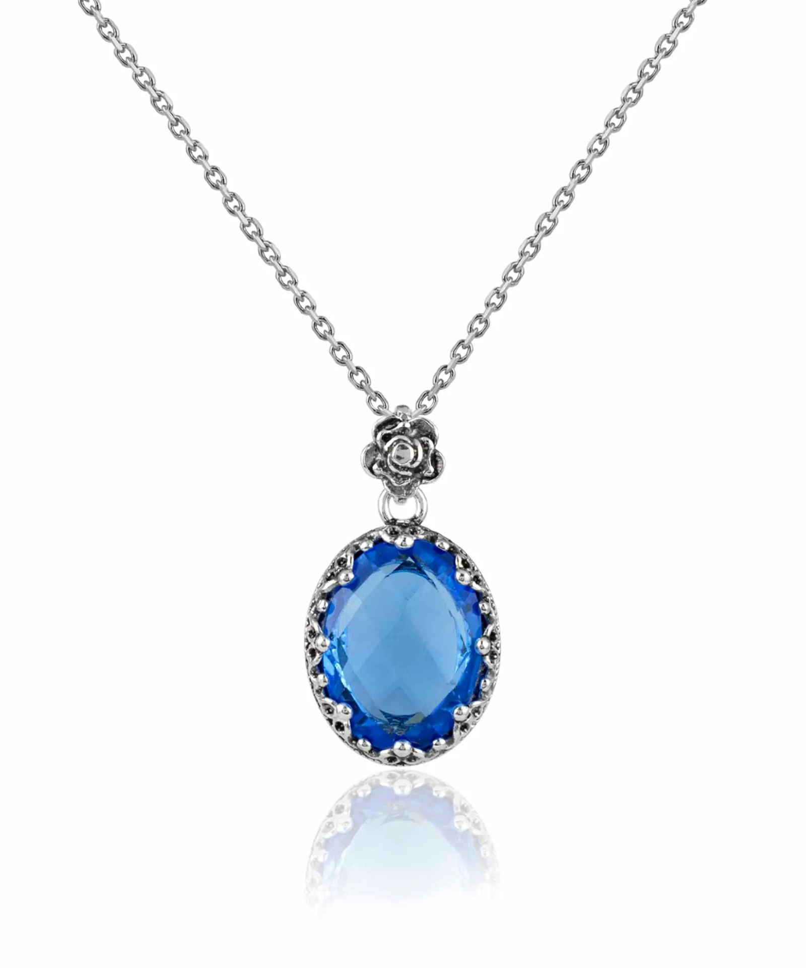 Filigree silver pendant necklace with oval blue quartz gemstone for women, featuring intricate metalwork design.