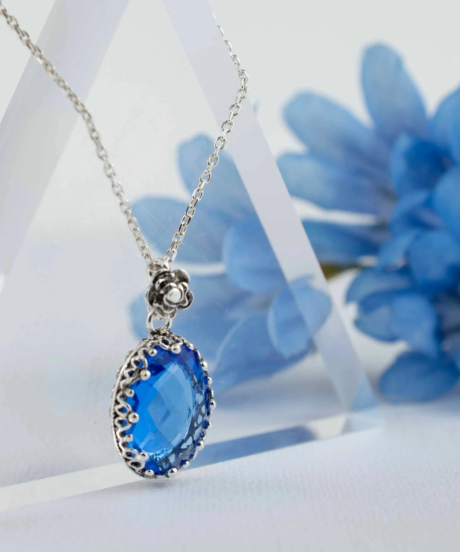Silver filigree oval pendant necklace featuring a blue quartz gemstone, designed for women, by Start2Finish jewelry.