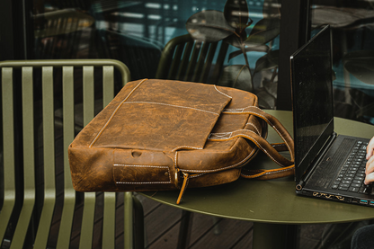 Vintage leather Welch Briefcase by Start2Finish, classic messenger bag with sturdy handles and authentic leather texture.
