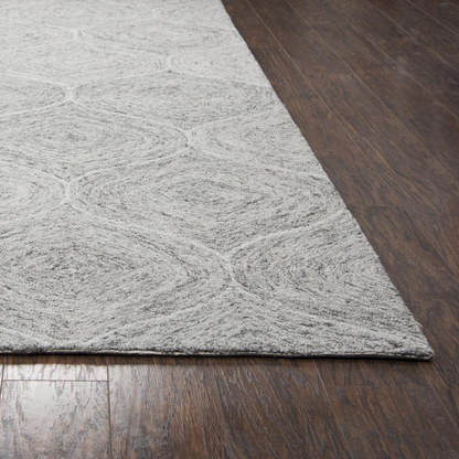 Hand tufted wool rug with loop pile in 5&
