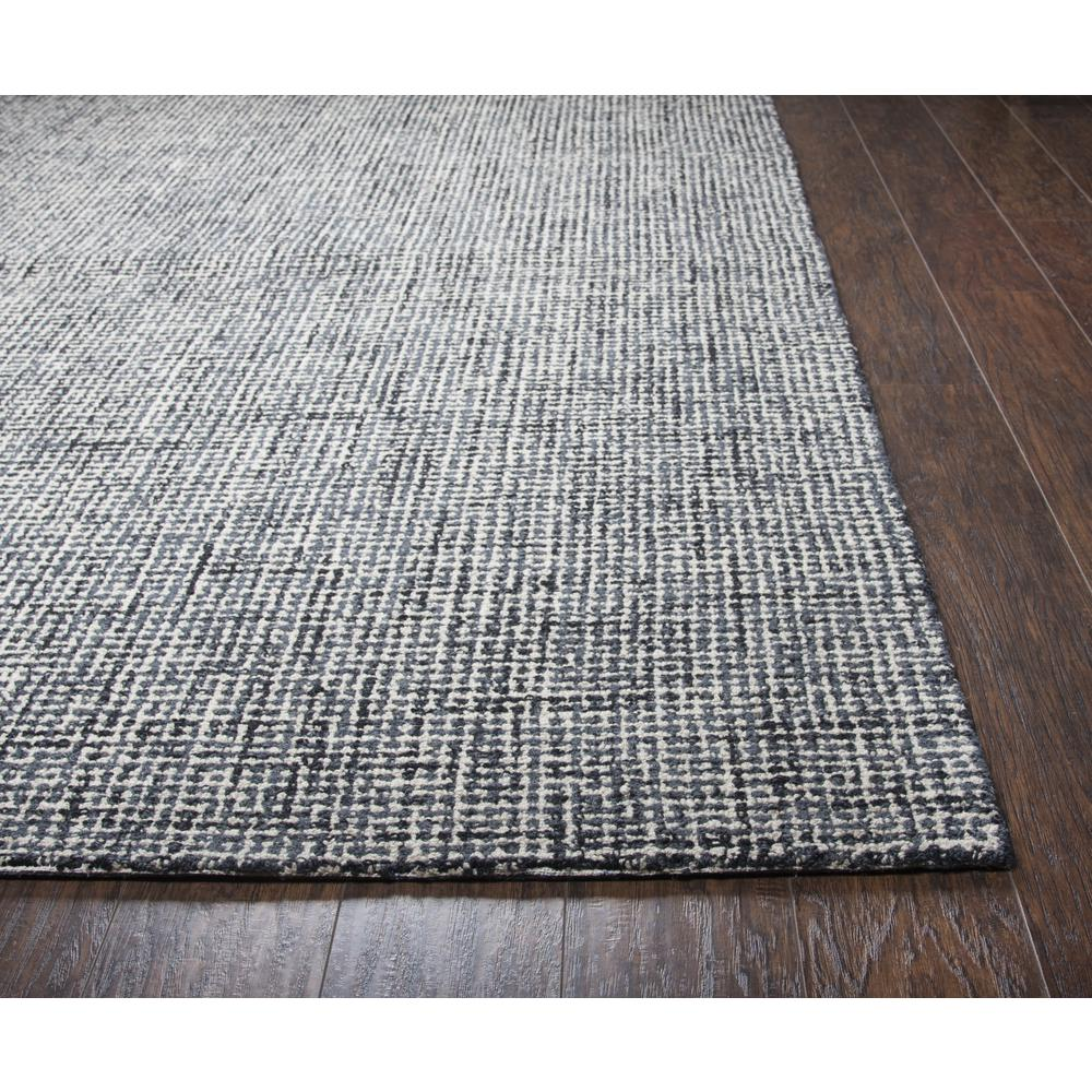Hand tufted wool rug with loop pile design, 5x8 feet, by Start2Finish, showcasing textured, soft surface in a neutral color.