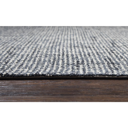 Hand tufted wool rug with loop pile in 5x8 size, featuring neutral tones and textured surface by Start2Finish.