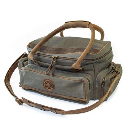 Start2Finish canvas and leather field bag with multiple pockets, durable straps, and classic design for outdoor accessories.