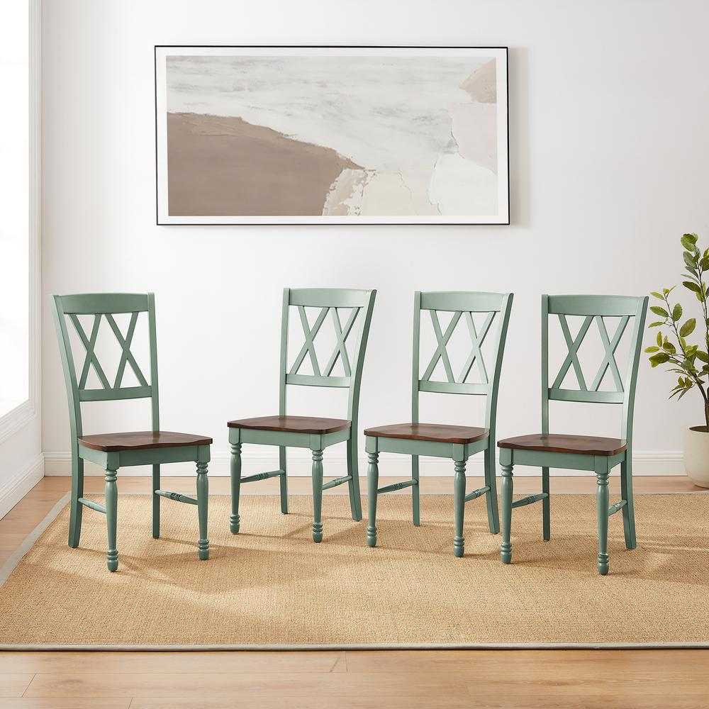 Set of four Shelby dining chairs by Start2Finish, featuring modern wooden frames and cushioned seats for a stylish dining room.
