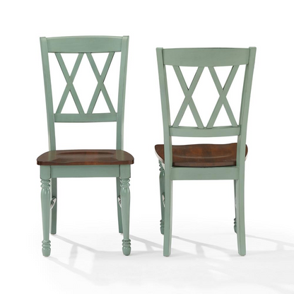 Start2Finish Shelby 2-piece dining chair set with modern upholstered seats and wooden legs, shown in a contemporary dining room setting.