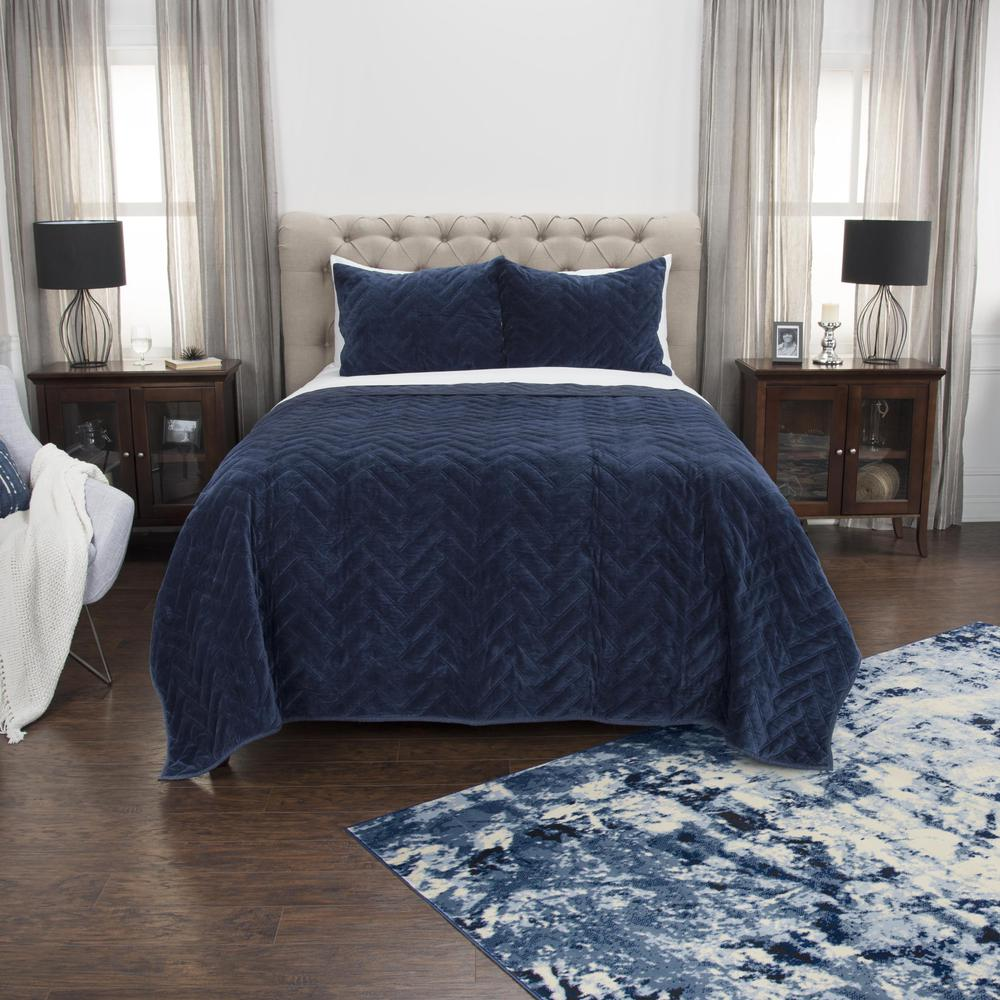 Start2Finish Donny Osmond quilt, 106x92 inches, featuring colorful and intricate fabric patterns on a neatly made bed.