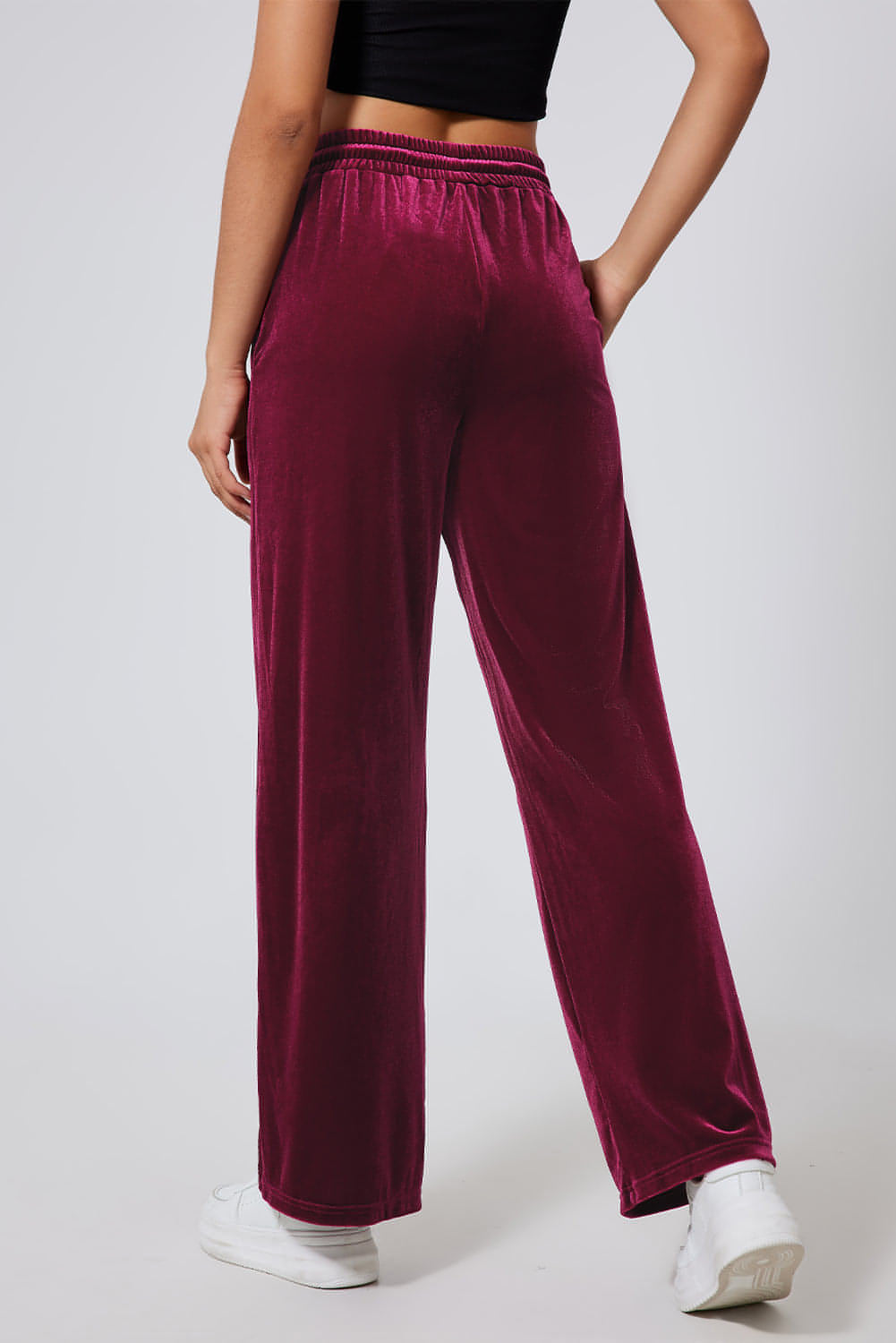 Burgundy Carmine Juneberry wide-leg pants with drawstring waist, made from solid fabric, relaxed fit and stylish for casual wear.