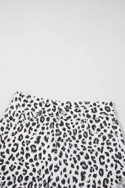 Leopard print frayed hem denim shorts for women by Ruby Styx, showing the stylish distressed details and lightweight fabric.