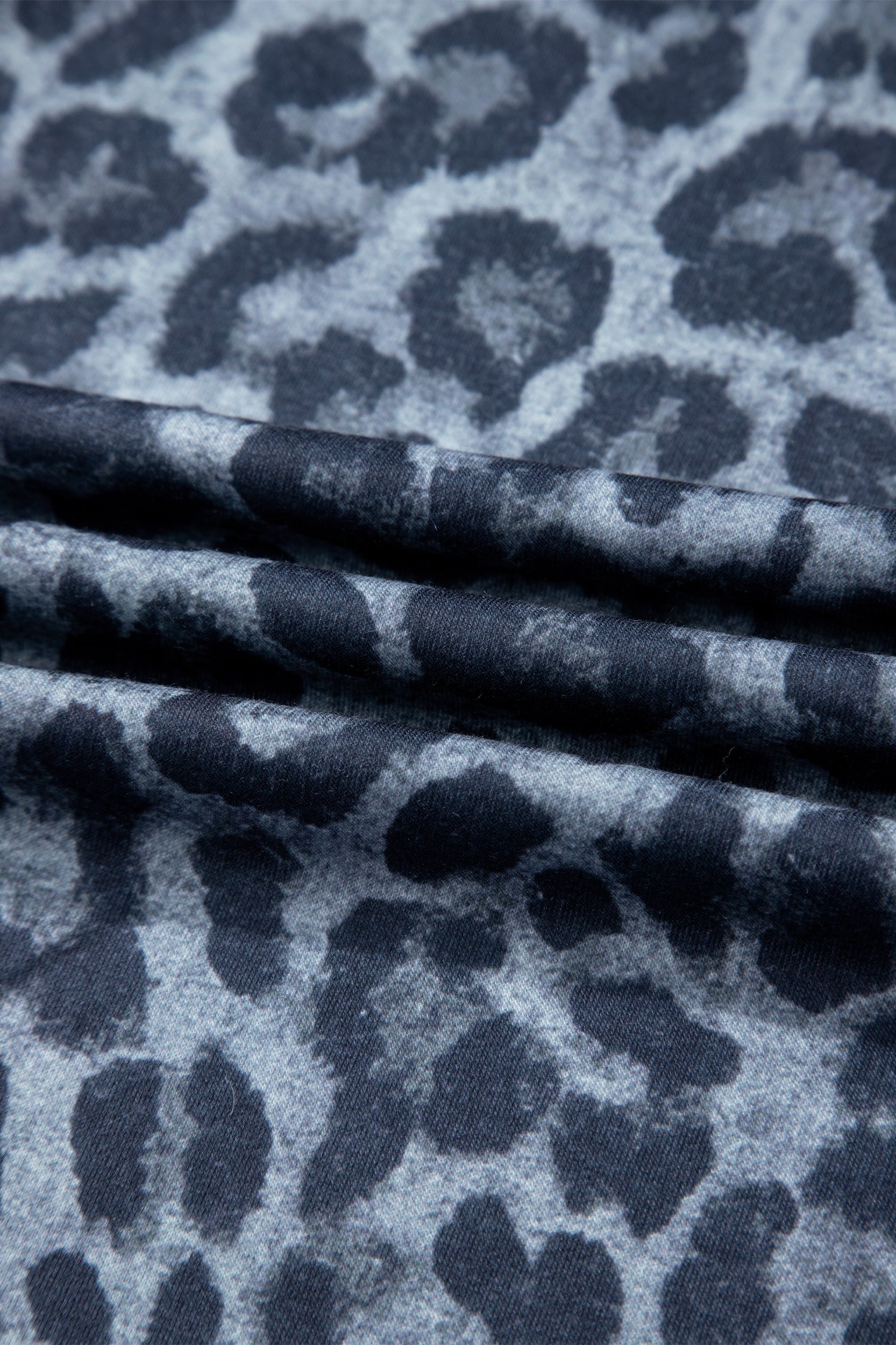 Leopard print frilled drawstring waist wide-leg pants for women by Byzantium Bay, showing the stylish waistband and flowing fabric.
