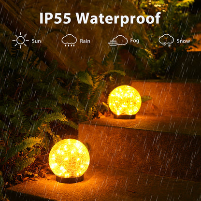 Pink Iolaus outdoor solar crack bottle 20-light waterproof decorative lighting, illuminated for garden or patio decor.