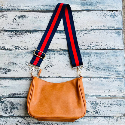 Start2Finish Lucy handbag with adjustable strap, featuring sleek design and stylish accessory details.