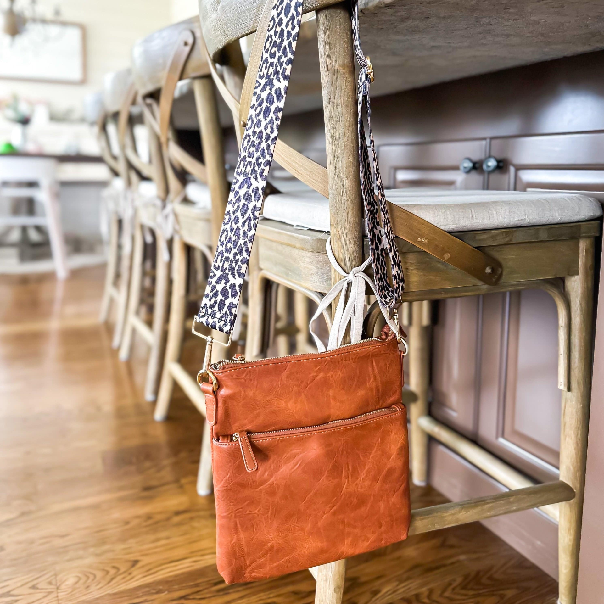 Start2Finish Chloe crossbody accessory with adjustable strap, showcasing a stylish black bag with a sleek design and versatile strap options.