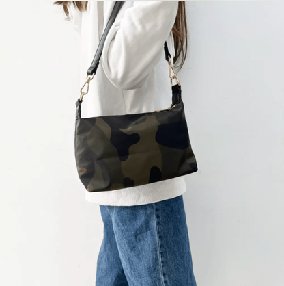 Start2Finish Everly Crossbody accessory with adjustable strap and sleek design, shown in stylish black fabric.