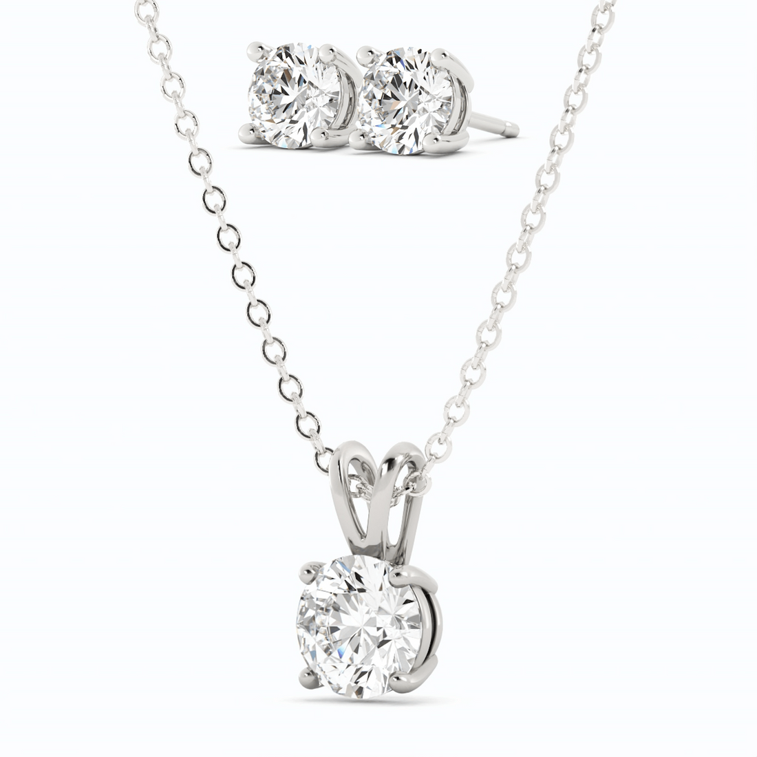 Start2Finish 3-carat total weight moissanite stud earrings and pendant necklace set in 14K white gold overlay, featuring sparkling gemstone designs.