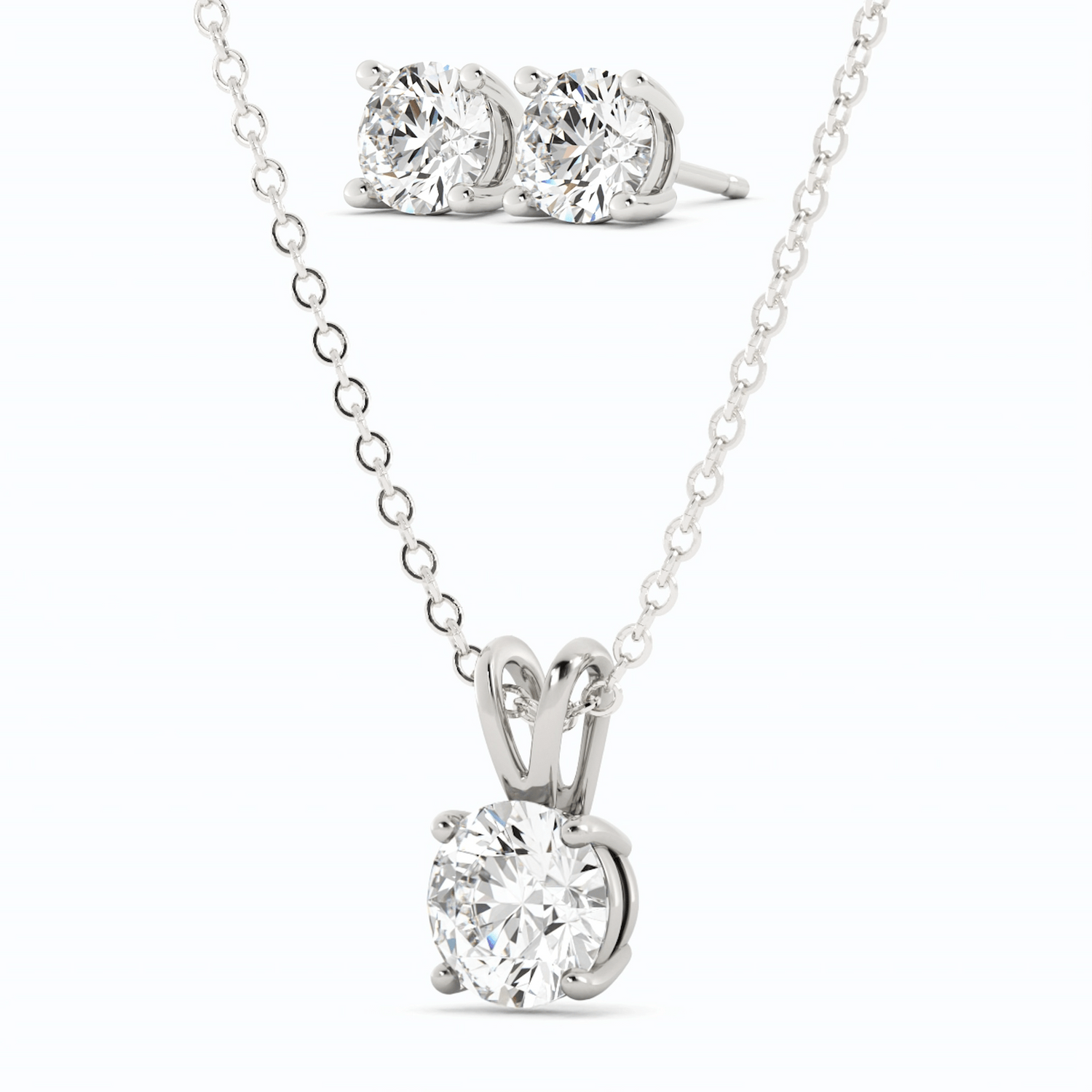 Start2Finish 3-carat total weight moissanite stud earrings and pendant necklace set in 14K white gold overlay, featuring sparkling gemstone designs.