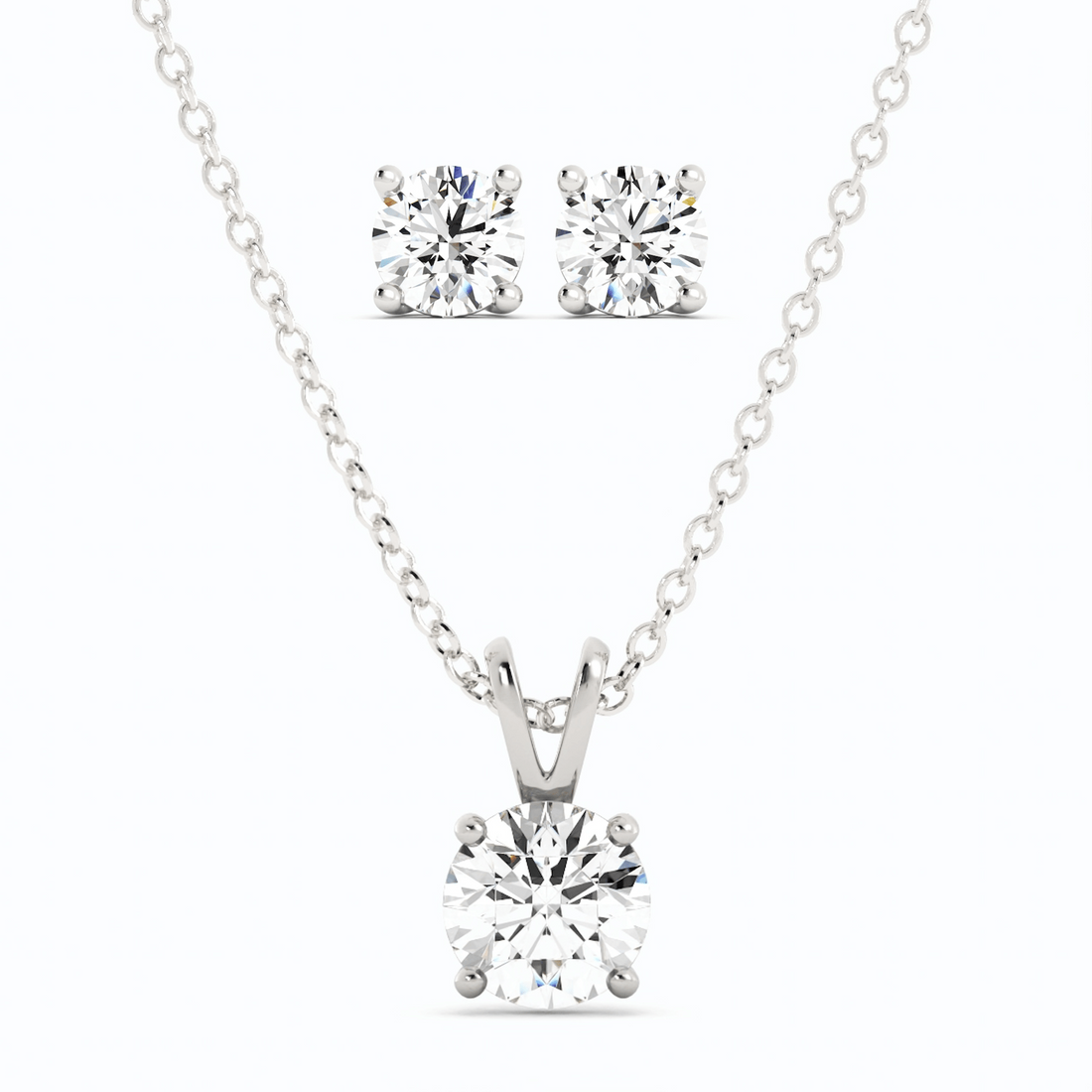 Start2Finish 3CTW moissanite stud earrings and pendant necklace set in 14K white gold overlay, featuring sparkling gemstone designs.