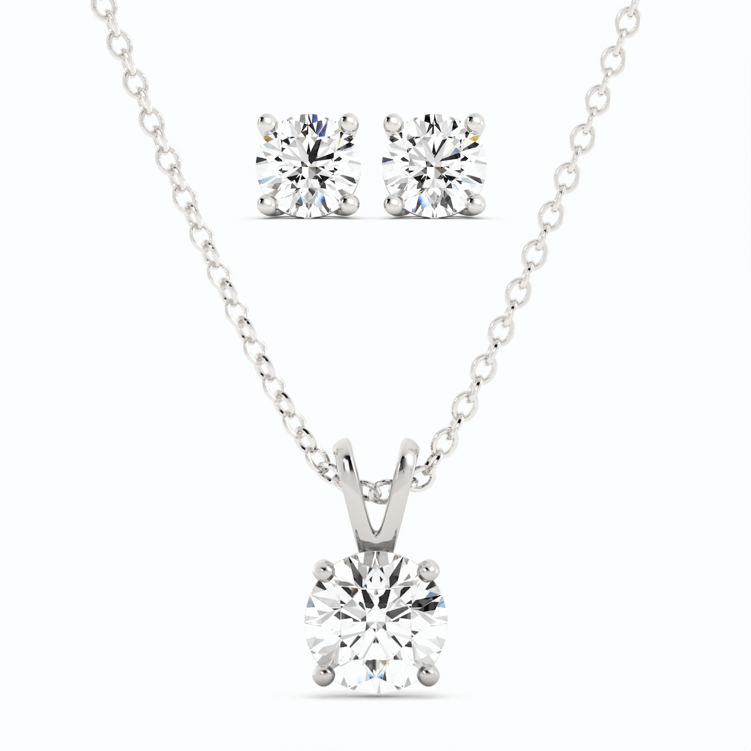 Start2Finish 3CTW moissanite stud earrings and pendant necklace set in 14K white gold overlay, featuring sparkling gemstone designs.