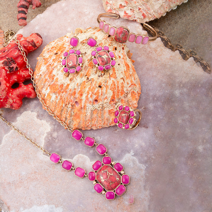 Start2Finish jewelry featuring a statement necklace with dual red magnesite and pink quartz beads and gold accents.