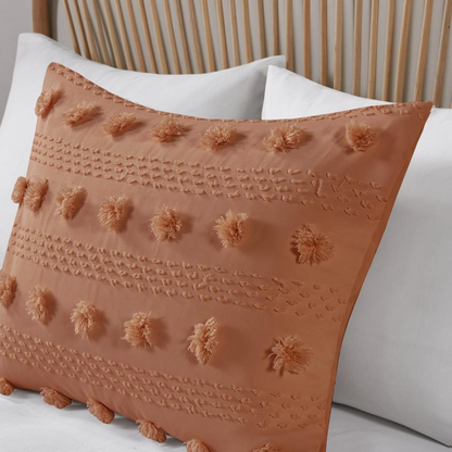 Lucy Clip Jacquard Comforter Set in rust color by Start2Finish, featuring intricate jacquard pattern and plush bedding texture.