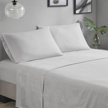 Start2Finish Jaxon Stripe Comforter Set with aqua and grey bed sheets, featuring a modern striped design for a cozy bedroom.