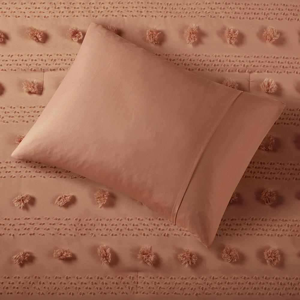 Lucy Clip Jacquard Comforter Set in rust color with intricate woven patterns, designed for cozy bedroom decor.