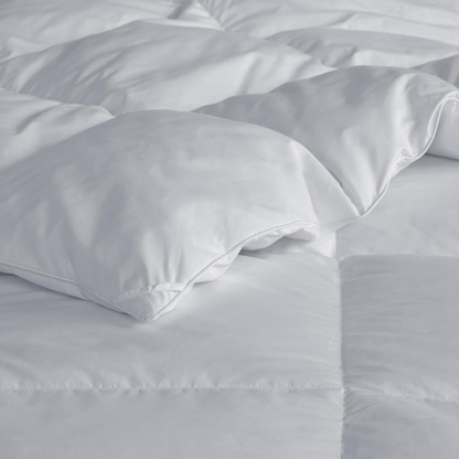Start2Finish goose feather and down oversize comforter with plush white fabric and fluffy filling for cozy, luxurious bedding.