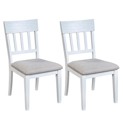 Set of 2 white Donham side chairs by Start2Finish with sleek, modern design and smooth wooden legs.