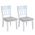 Set of 2 white Donham side chairs by Start2Finish with sleek, modern design and smooth wooden legs.