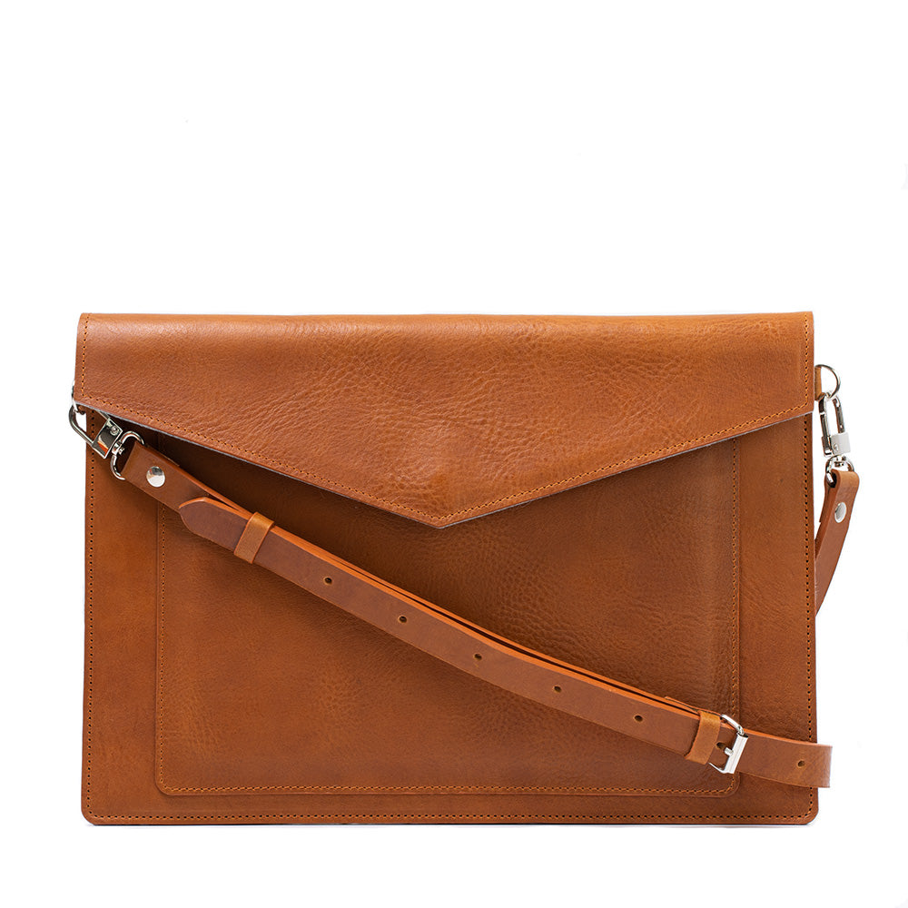 Start2Finish leather bag for MacBook and iPad with a front pocket, stylish accessories for tech protection and organization.