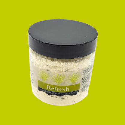 Start2Finish Milk Bath Refresh mini with lemongrass and mint, showing a white bath product with fresh herbs and a soothing appearance.