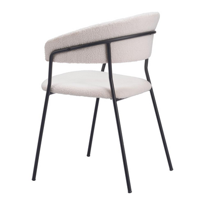 Pair of Josephine dining chairs in cream from Start2Finish, featuring cushioned seats and sleek wooden legs.