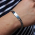 Personalized steel chain bracelet by Fuchsia Molly featuring a sleek silver design with custom engraved details.